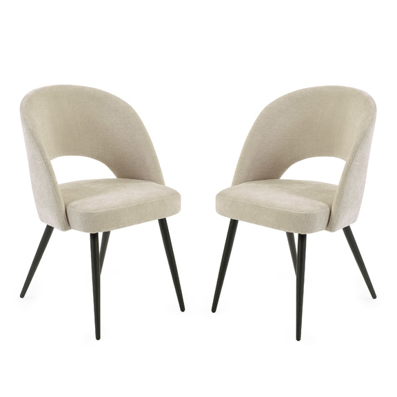 Two beige upholstered chairs with black legs on a white background