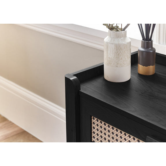 Close-up of black wooden top surface on 5 drawer chest