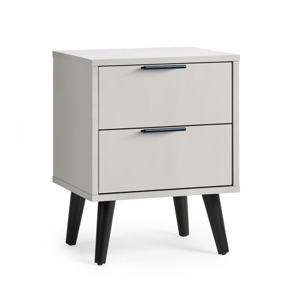 White nightstand with two drawers and black legs on a white background