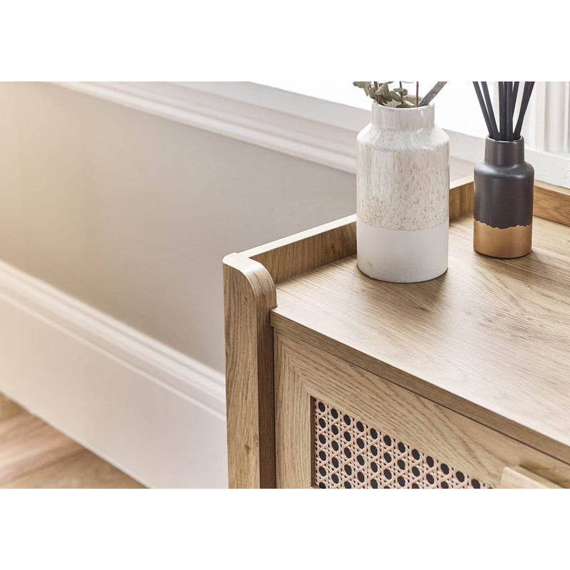 Close-up of oak effect wooden top on 5 drawer chest