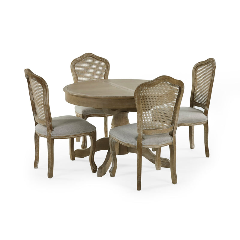 Round dining table with four matching chairs on a white background