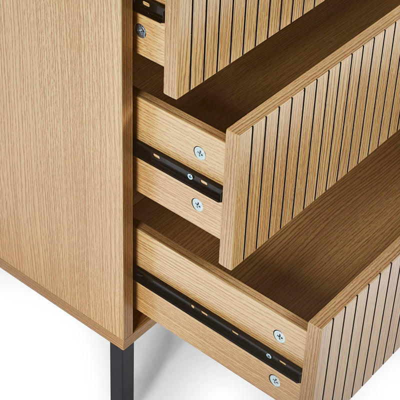 Wooden cabinet with open drawers on a white background