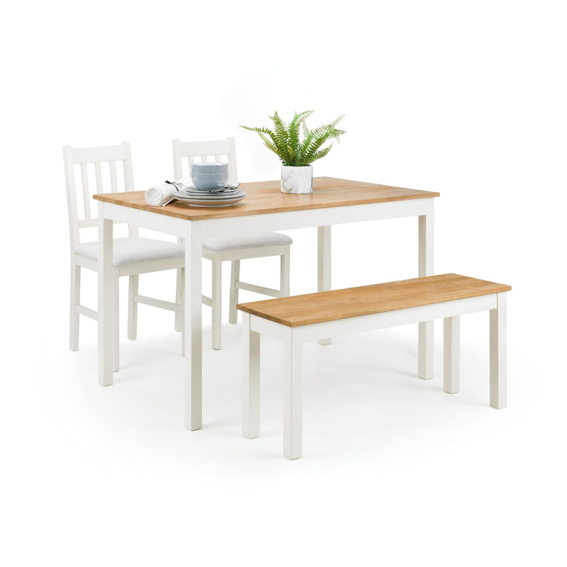 Dining set with table, chairs, and bench on a white background