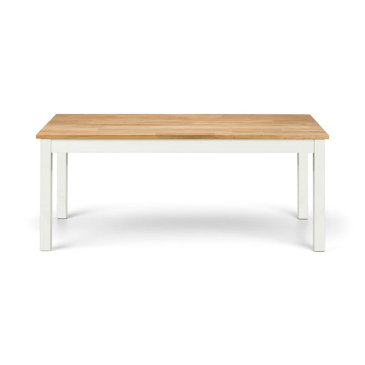 Wooden table with white legs on a white background