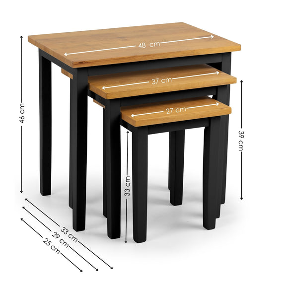 Set of three wooden nesting tables with dimensions on a white background