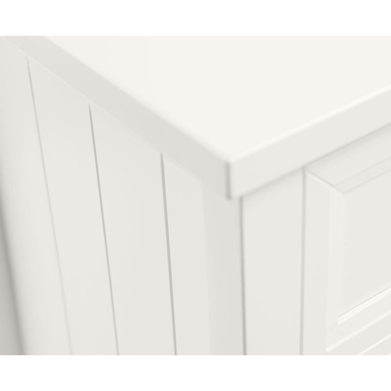 Close-up of a white wooden panel with a geometric pattern