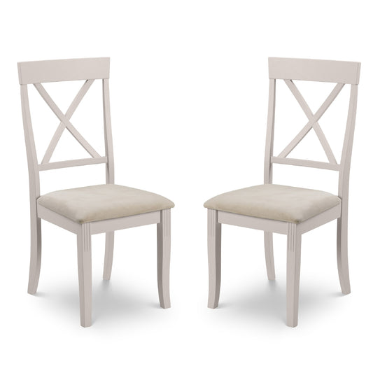 Two white chairs with beige seats on a white background