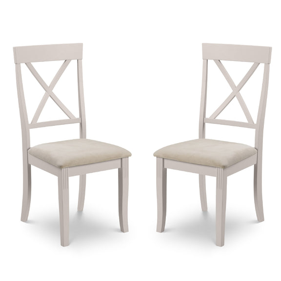 Two white chairs with beige seats on a white background