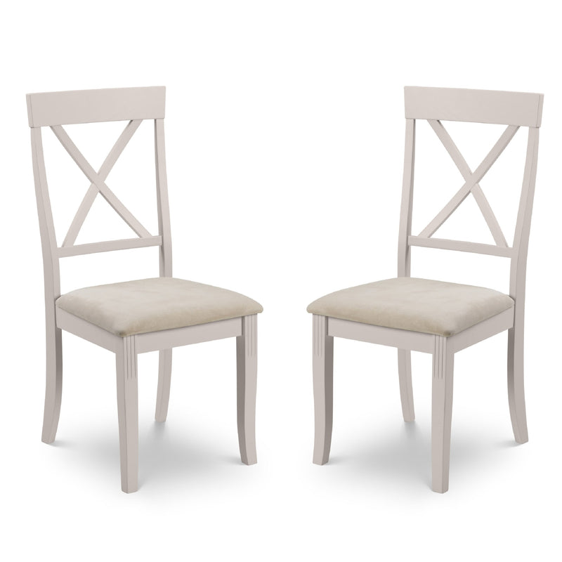 Two white chairs with beige seats on a white background