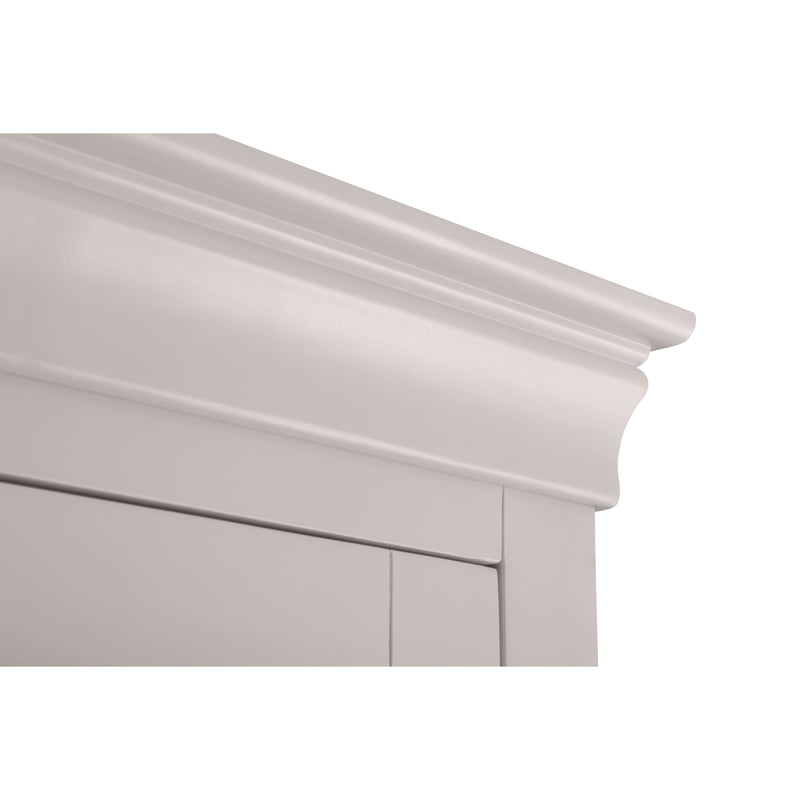Close-up of a white crown molding on a white wall