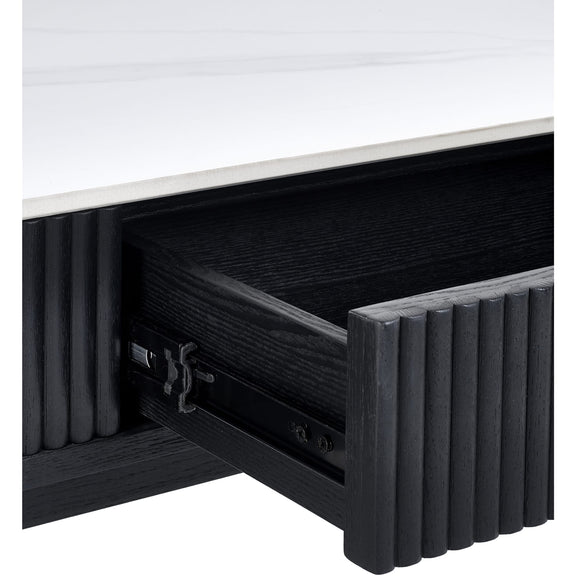 Black drawer with white top on a light gray background
