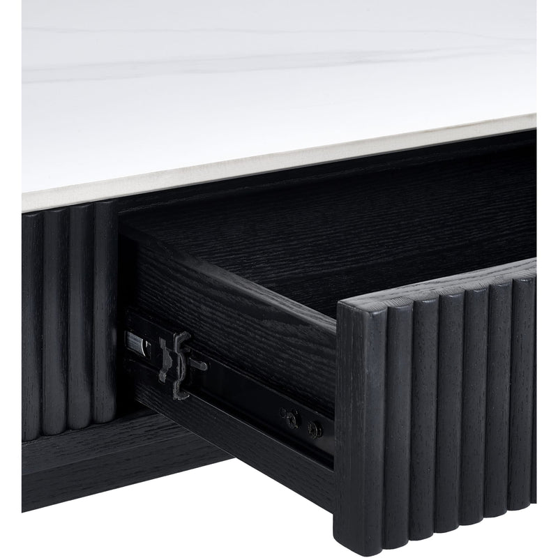 Black drawer with white top on a light gray background