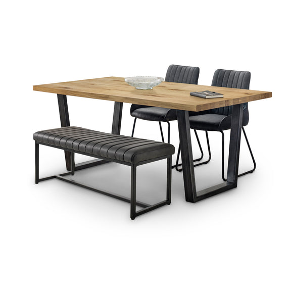 Dining set with wooden table, black chairs, and bench on a white background