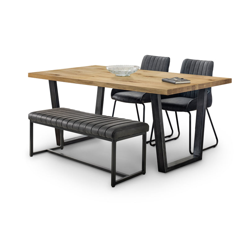 Dining set with wooden table, black chairs, and bench on a white background