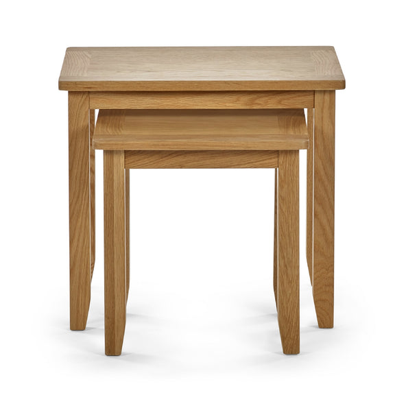 Set of two wooden nesting tables on a white background
