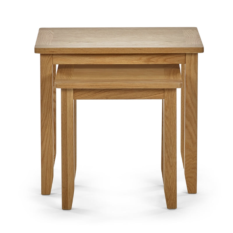 Set of two wooden nesting tables on a white background