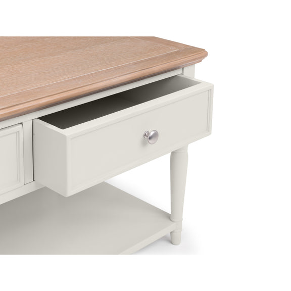 Wooden desk with a drawer on a white background