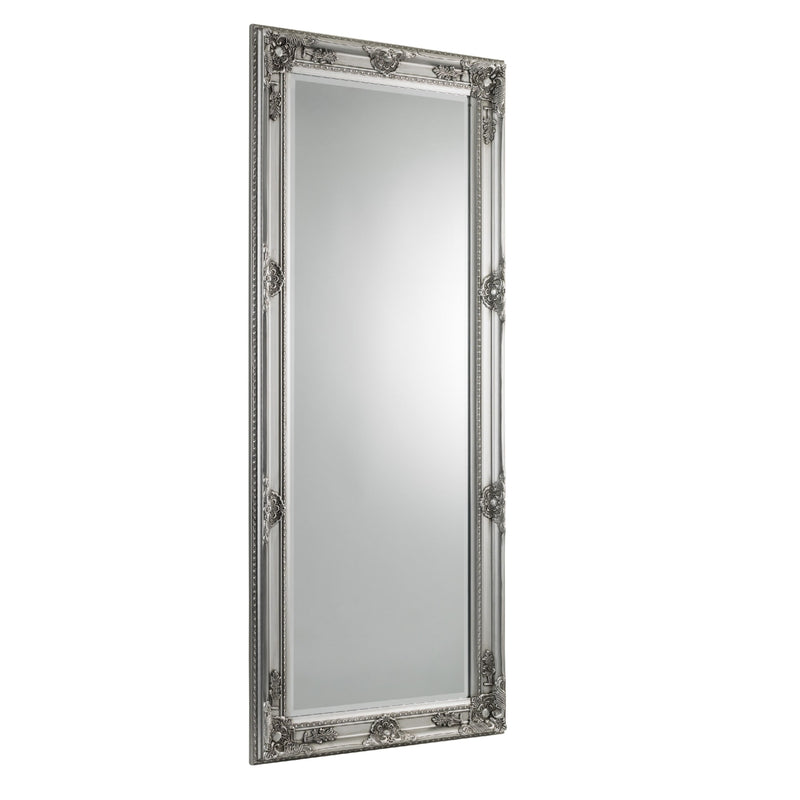 Decorative silver-framed mirror on a white background
