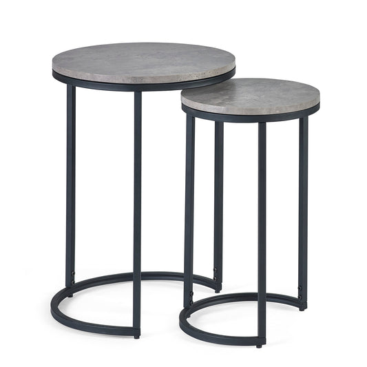 Two round side tables with concrete tops and black metal frames on a white background