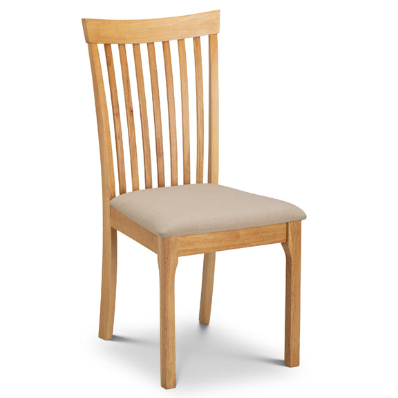 Wooden chair with a beige cushion on a white background