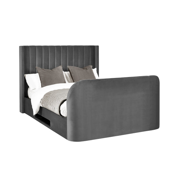 Gray upholstered bed with pillows on a white background
