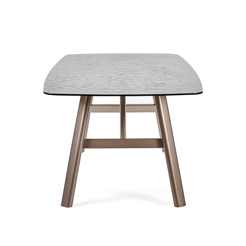 Small table with a textured surface and wooden legs on a white background