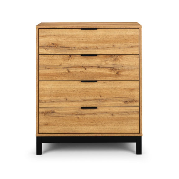 Wooden dresser with four drawers on a white background