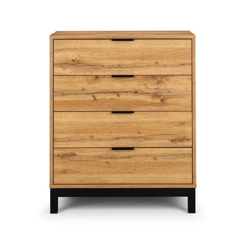Wooden dresser with four drawers on a white background