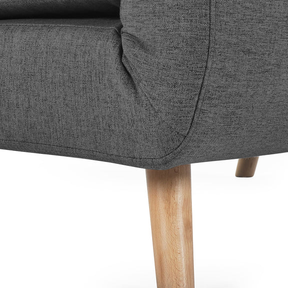 Gray upholstered chair with wooden legs on a white background