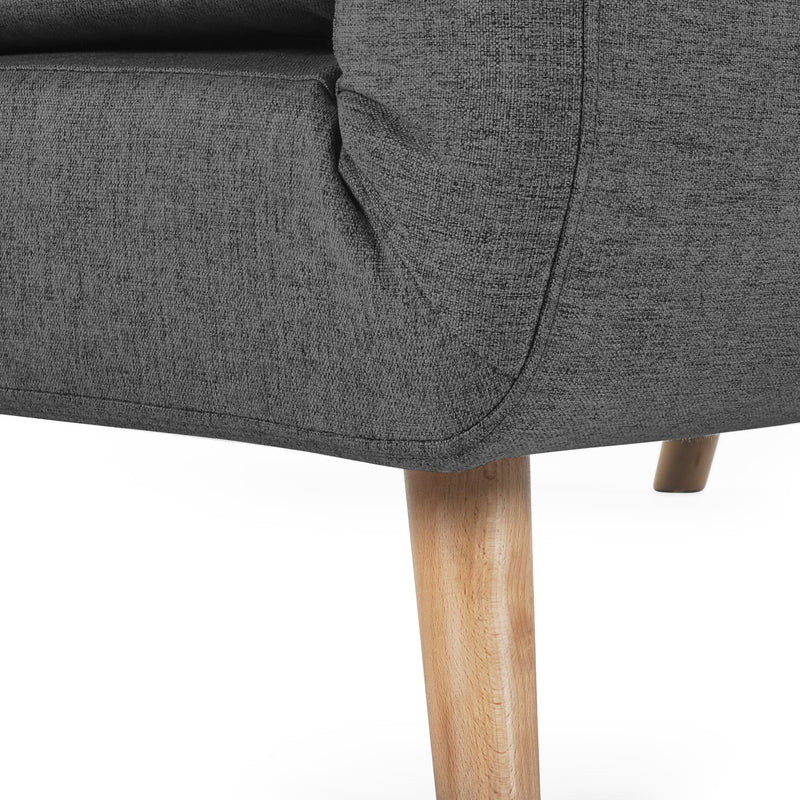 Gray upholstered chair with wooden legs on a white background