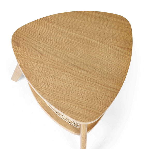 Wooden side table with a unique triangular shape on a white background