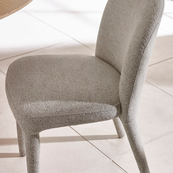 Textured chair on a light wooden floor