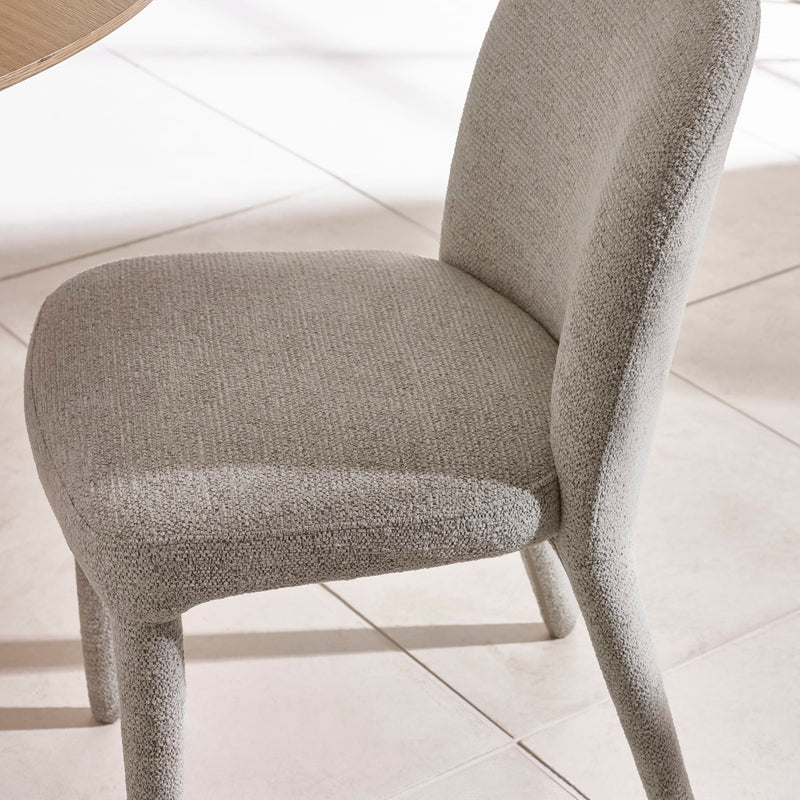 Textured chair on a light wooden floor
