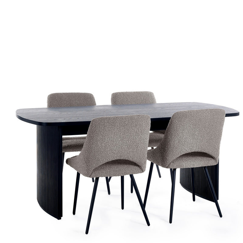 Dining table with four chairs on a white background