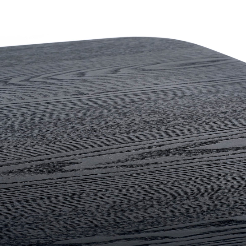 Round wooden table with a dark finish on a white background