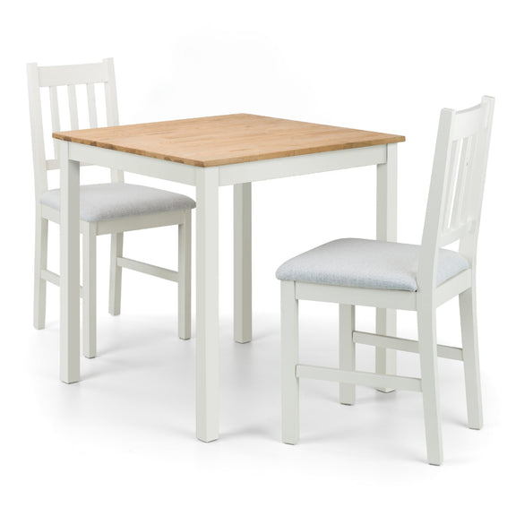 Dining table with two chairs on a white background
