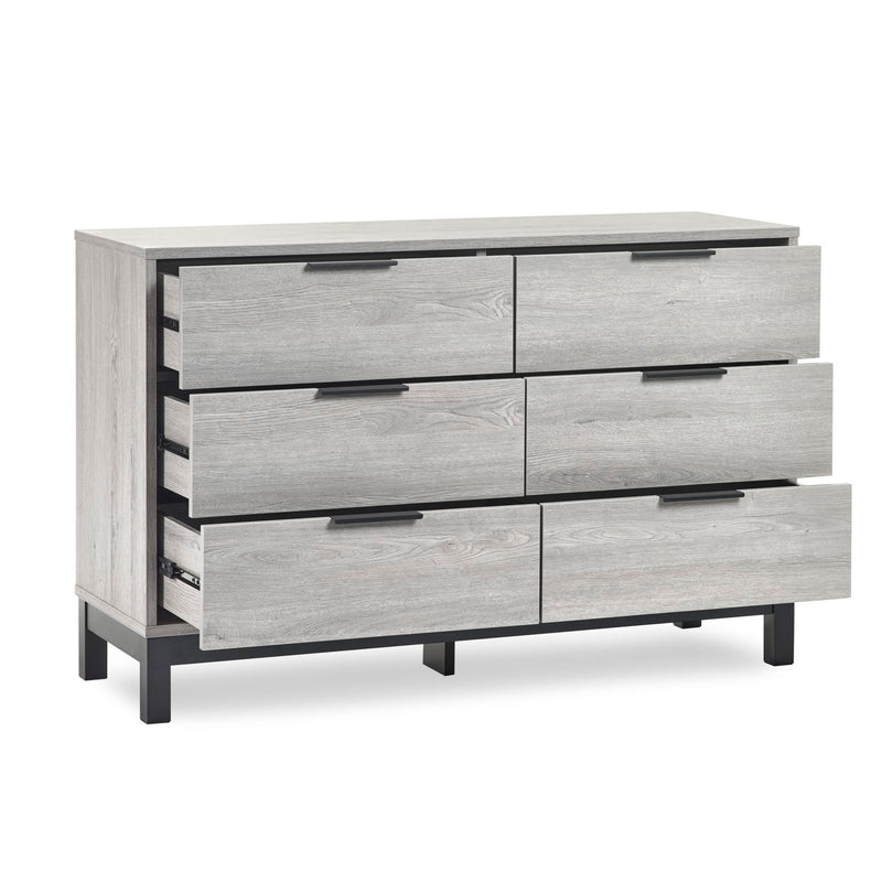 Gray dresser with six drawers on a white background