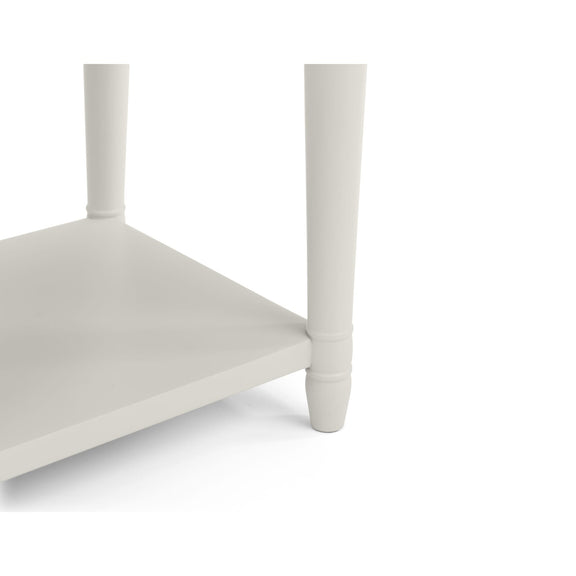 White corner shelf with a single shelf on a white background