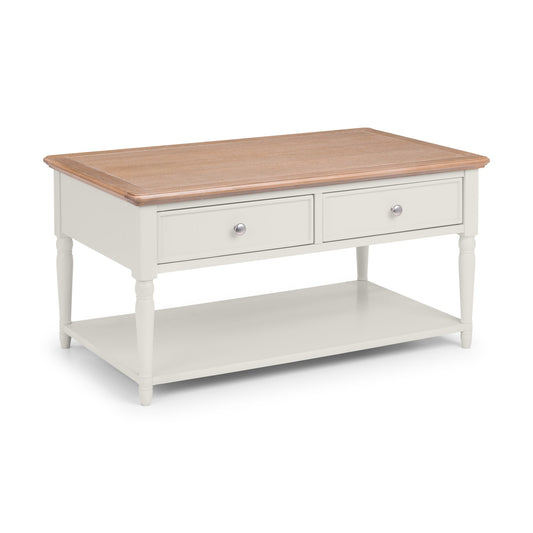 Wooden coffee table with white base on a white background