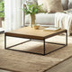 Wooden coffee table with decorative items in a living room setting