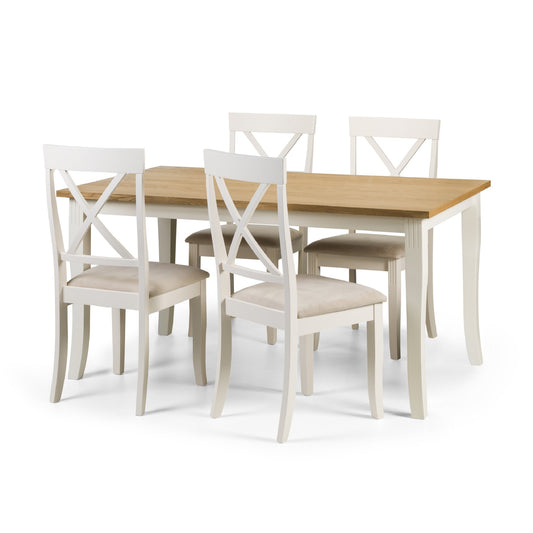 Dining table set with four chairs on a white background