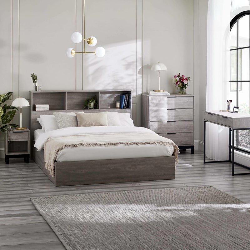 Modern bedroom with gray bed, nightstands, and dresser.