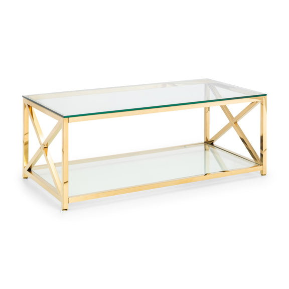 Gold coffee table with glass top and shelf on a white background