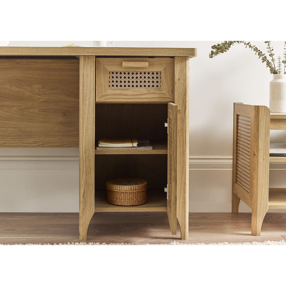 Wooden cabinet with open door revealing interior shelves and a woven basket.