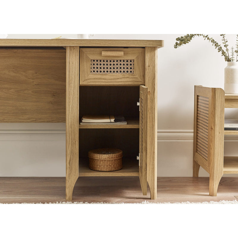 Wooden cabinet with open door revealing interior shelves and a woven basket.