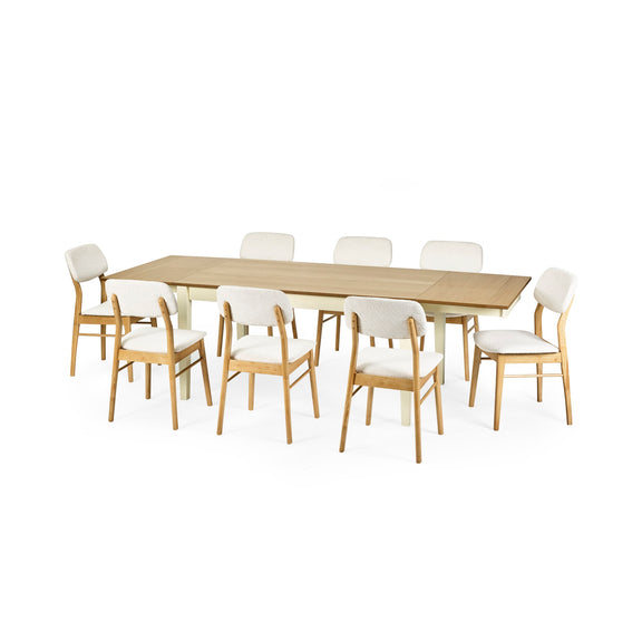 Wooden dining table with eight white chairs on a white background