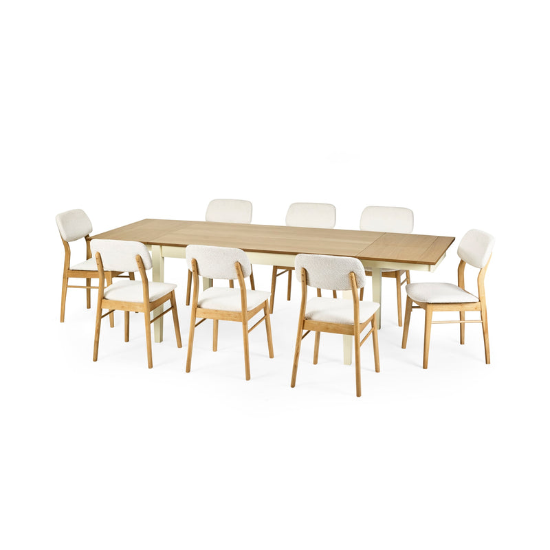 Wooden dining table with eight white chairs on a white background