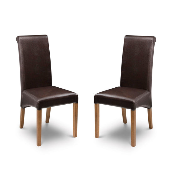 Two brown leather chairs on a white background