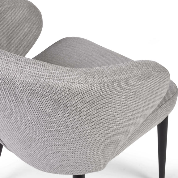 Close-up of a gray textured chair on a white background