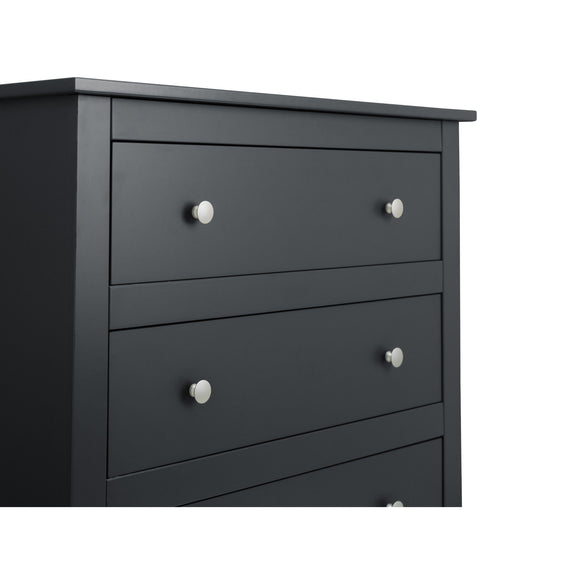 Black dresser with four drawers and white knobs on a white background